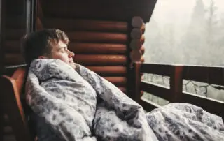 Bundle up in blankets to stay warm through a Maine snow storm